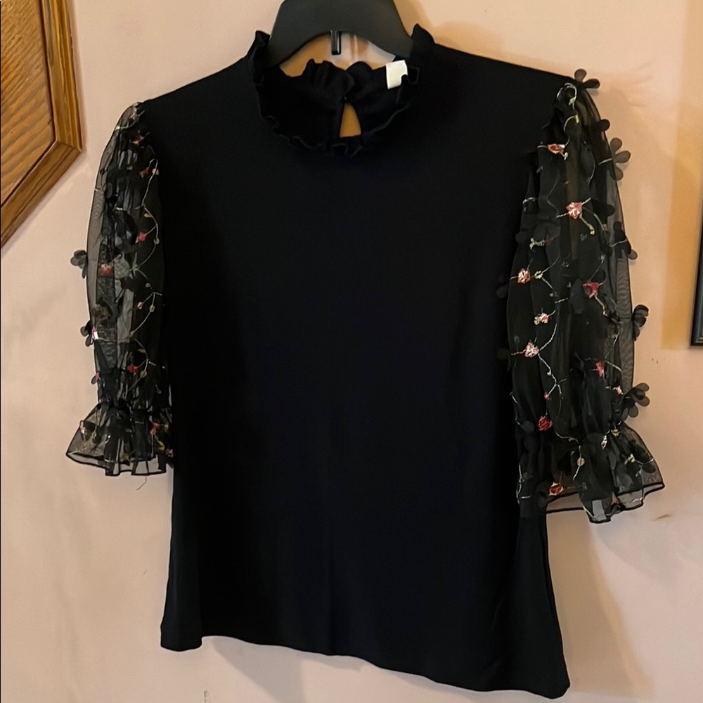 Black Top with soft ribbing and sheer black 3/4 sleeves with embroidered detail